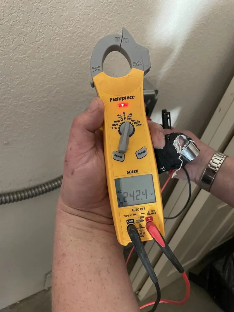 Voltage testing with clamp meter during Aluminum Wiring Replacement in Sidney
